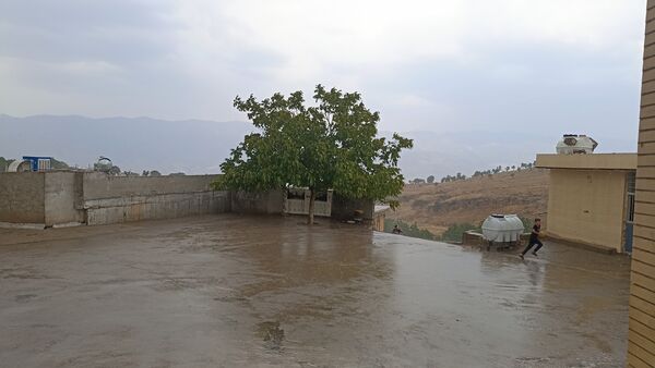اولین بارش تابستانه در روستای کینک