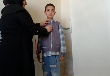 اندازه‌گیری لباس فرم در دبستان امید انقلاب وردنجان 