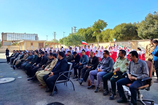 مراسم بازگشایی مدارس و گرامیداشت هفته دفاع مقدس در ثلاث باباجانی 