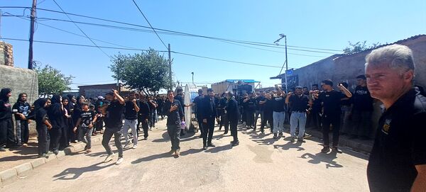 عزاداری ظهر عاشورا در روستای حسن آباد بلهر 