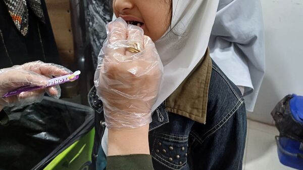 اجرای طرح وارنیش فلوراید در دبستان لطیفه 