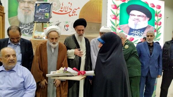 مراسم اولین سالگرد شهادت  سید حسن نصرالله، شهید حاج عباس نیلفروشان و سید هاشم صفی الدین در گلستان شهدا اصفهان 