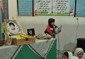 برپایی محفل انس با قرآن به یاد شهید محمد حسین فلاح حسینی در دبستان علمدار تفت