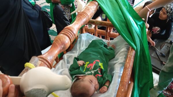 سربازان کوچک امام زمان در همایش شیرخوارگان حسینی شهرستان بن