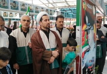 ادای احترام خادمیاران رضوی قم به مزار شهدا