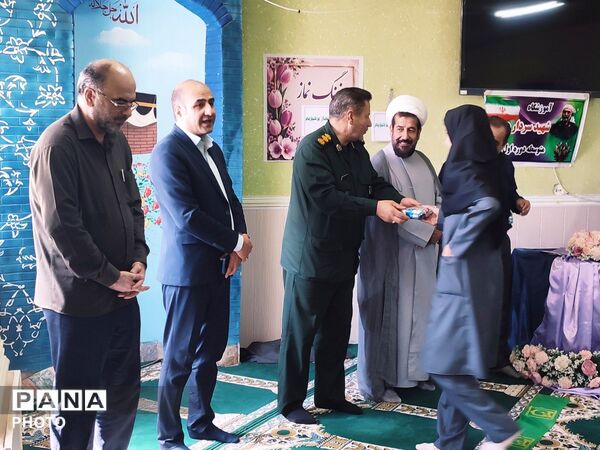 آیین نمادین «زنگ نماز» در دبیرستان سردار شهید همدانی منطقه جوکار