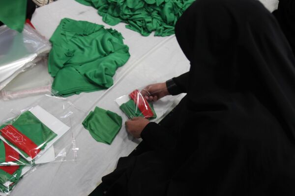 بسته‌بندی لباس همایش شیرخوارگان حسینی زنجان