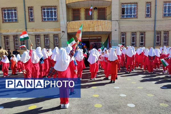 مراسم بازگشایی مدارس و گرامیداشت هفته دفاع مقدس در ثلاث باباجانی 