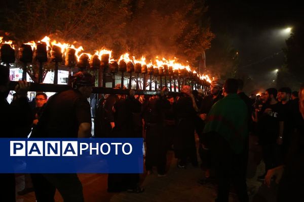 آیین «مشعل گردانی» نجفی‌های مقیم قم