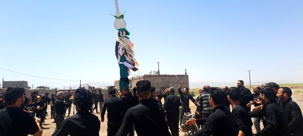 عزاداری ظهر عاشورا در روستای حسن آباد بلهر 