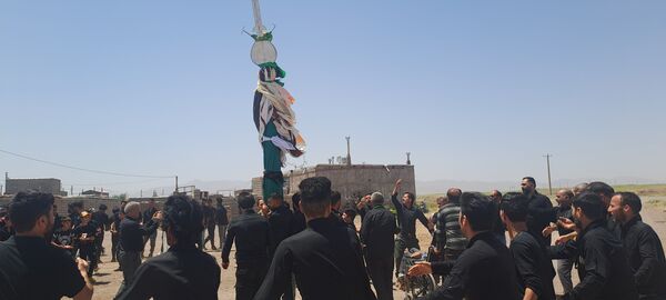 عزاداری ظهر عاشورا در روستای حسن آباد بلهر 