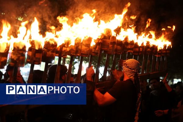 آیین «مشعل گردانی» نجفی‌های مقیم قم