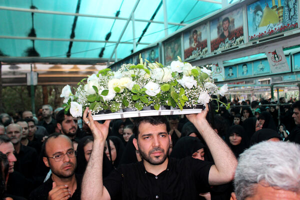 خاکسپاری نوجوان شهید «محمدحسین خاکی» در گلزار شهدای قم