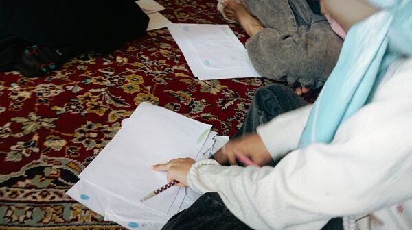 برپایی غرفه کودک در حاشیه نماز جمعه 