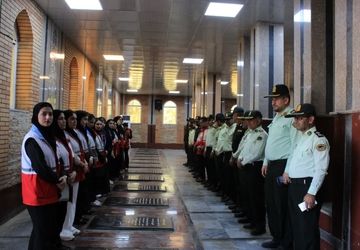 آیین غبارروبی و عطرافشانی گلزار شهدا در گچساران 