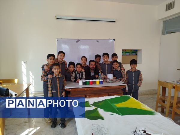 نقاشی همگانی توسط دانش‌آموزان دبستان شهید پسندیده فدافن