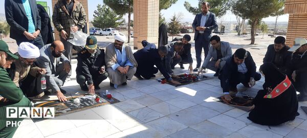 غبارروبی و عطرافشانی مزار شهدای شهر باخرز