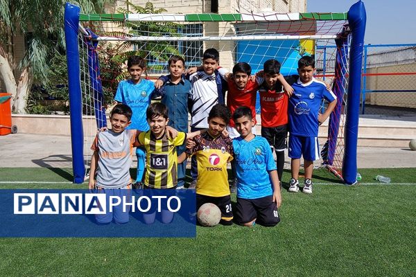 آیین افتتاحیه زمین چمن مصنوعی دبستان علی بن ابیطالب (ع) باقرشهر 