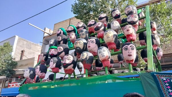 زنان و مردان بن در آیین گل‌زنی؛ هم‌نوا با کاروان کربلا