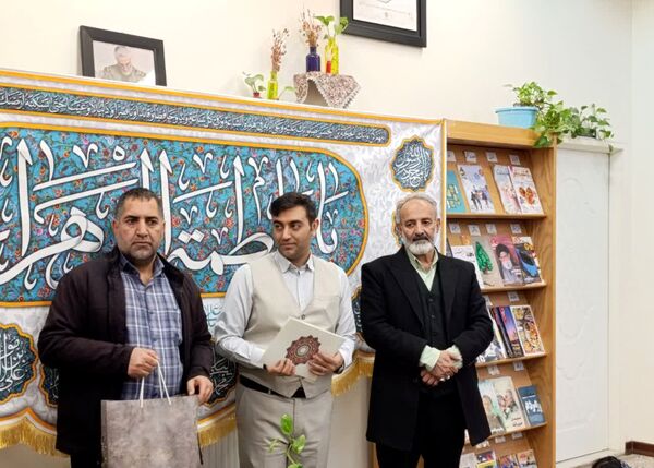 تقدیر از مادر شهید مهدی زاهدلویی در کتابخانه امام علی(ع) قم