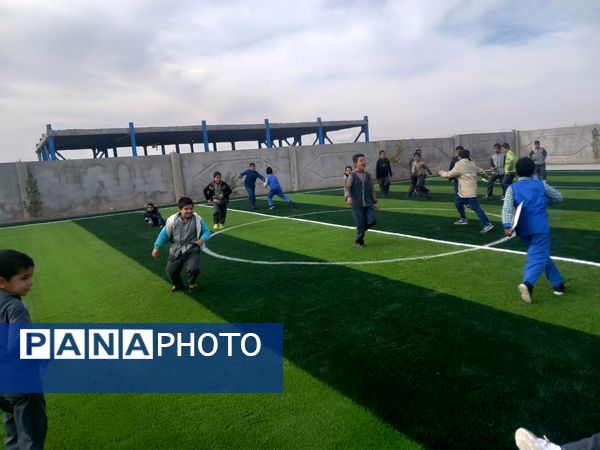 افتتاح زمین چمن مدرسه شهید غلامی خلیل آباد